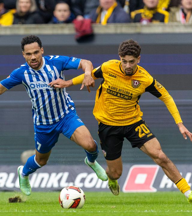 Herbert Bockhorn (FC Magdeburg) und Ben Bobzien (Dynamo Dresden) im Zweikampf am 18.10.2026 in Dresden.