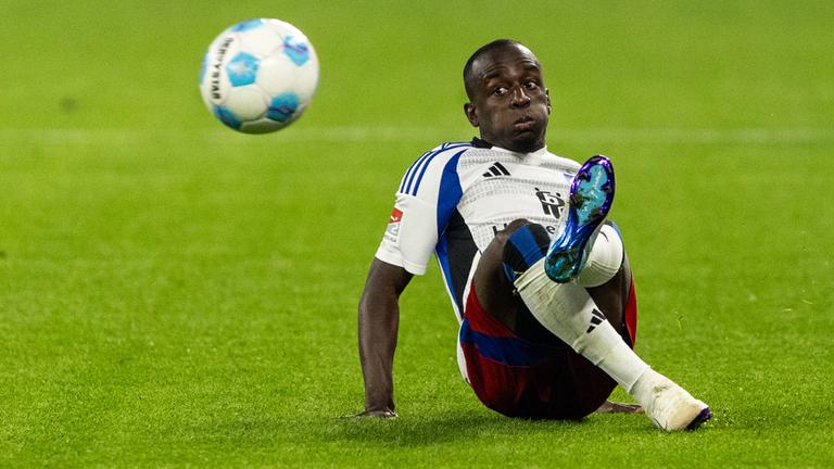 Hamburgs Jean-Luc Dompe in Aktion beim Spiel gegen Schalke 04.