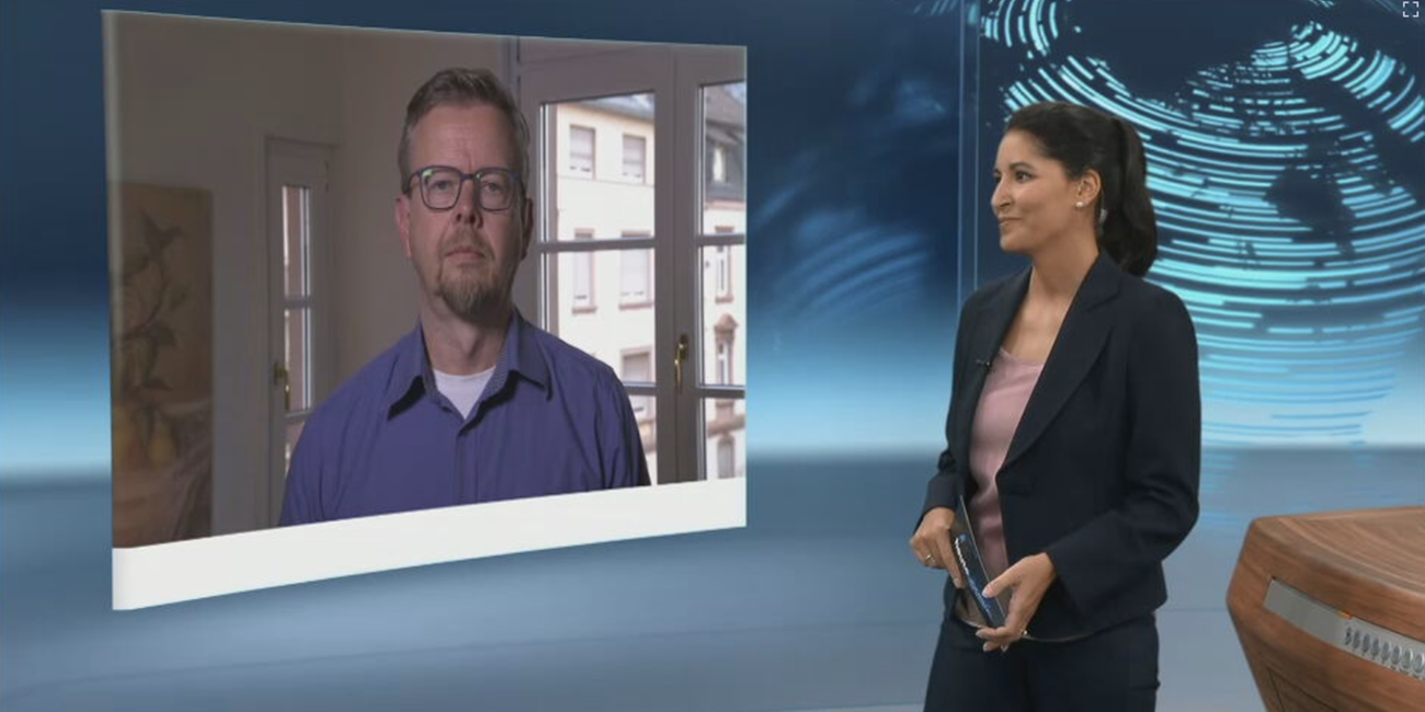 Laura Barnick im Schaltgespräch mit Politologe Christian Lammert.