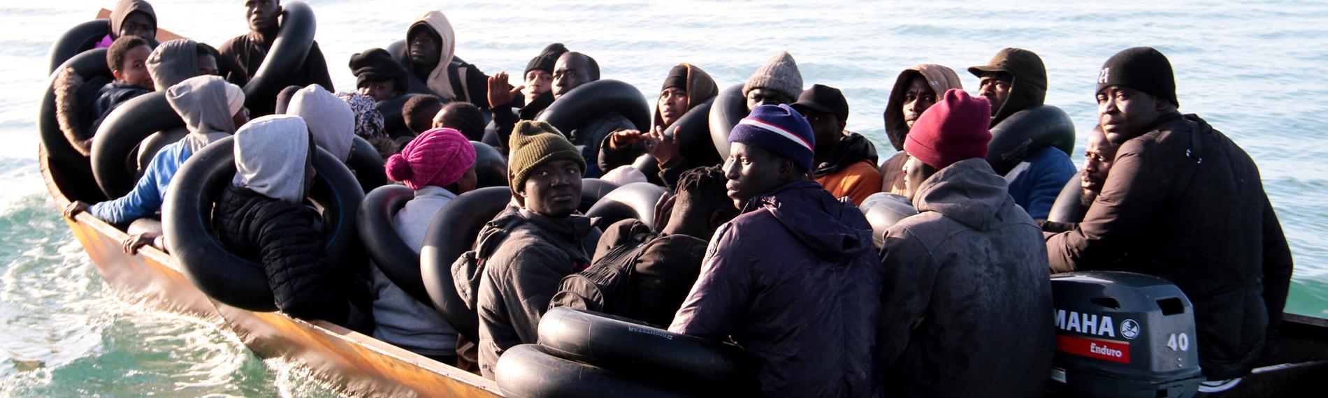 Flüchtlinge in einem Blechboot