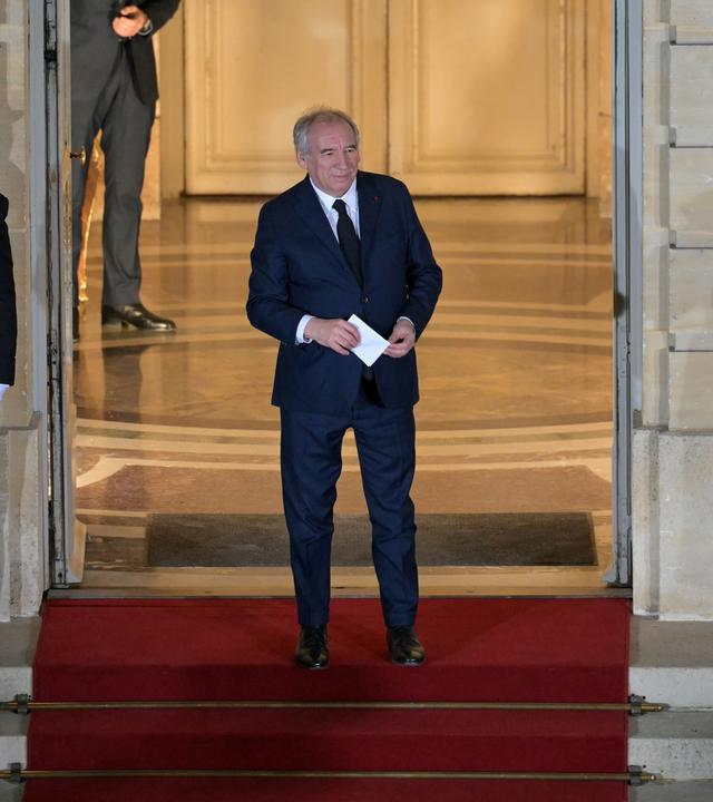 Newly-appointed Prime Minister Francois Bayrou looks on at the end of the handover ceremony at the Hotel Matignon in Paris, France, 13 December 2024. French President Macron named Francois Bayrou as the country's new prime minister on 13 December 2024. The appointment follows premier Michel Barnier's resignation after a no-confidence vote in the National Assembly on 04 December 2024