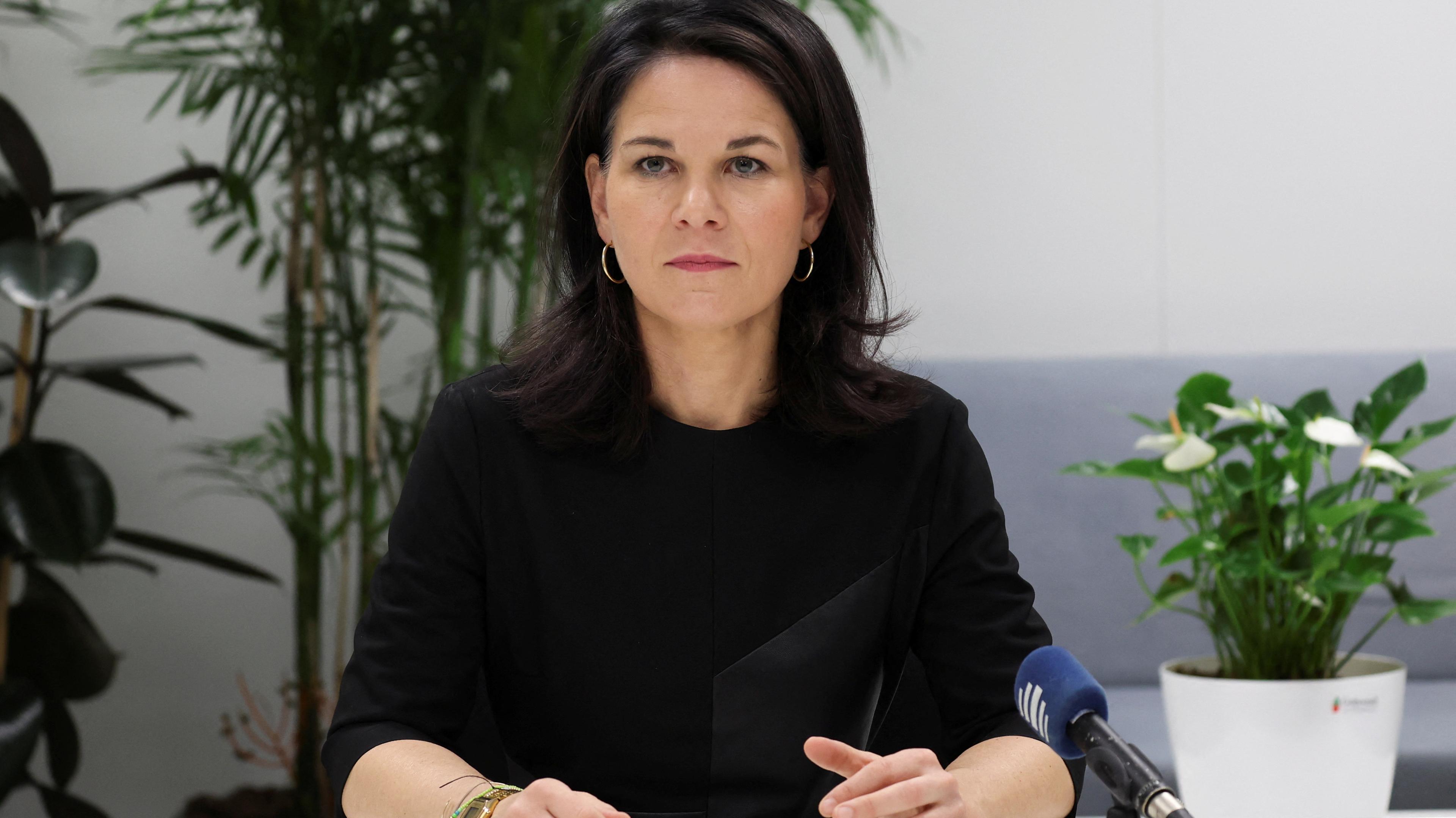 Germany_s Foreign Minister Annalena Baerbock meets with media members at the German delegation office during the COP29 United Nations climate change conference in Baku
