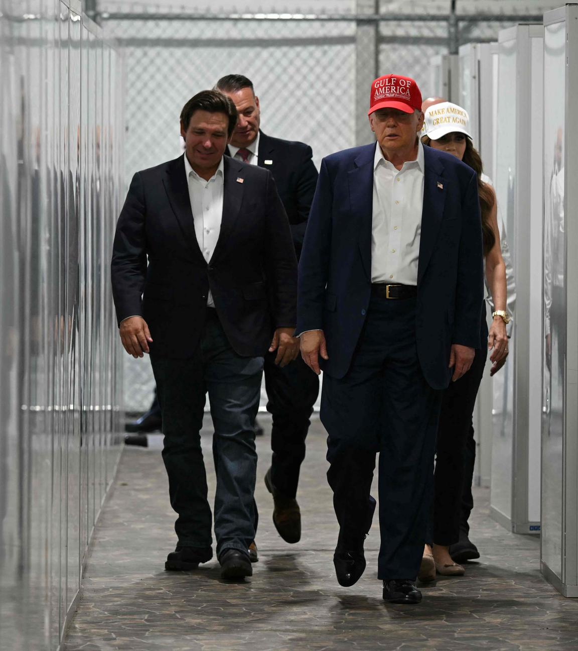 US President President Donald Trump visits a detention center located in the Florida Everglades