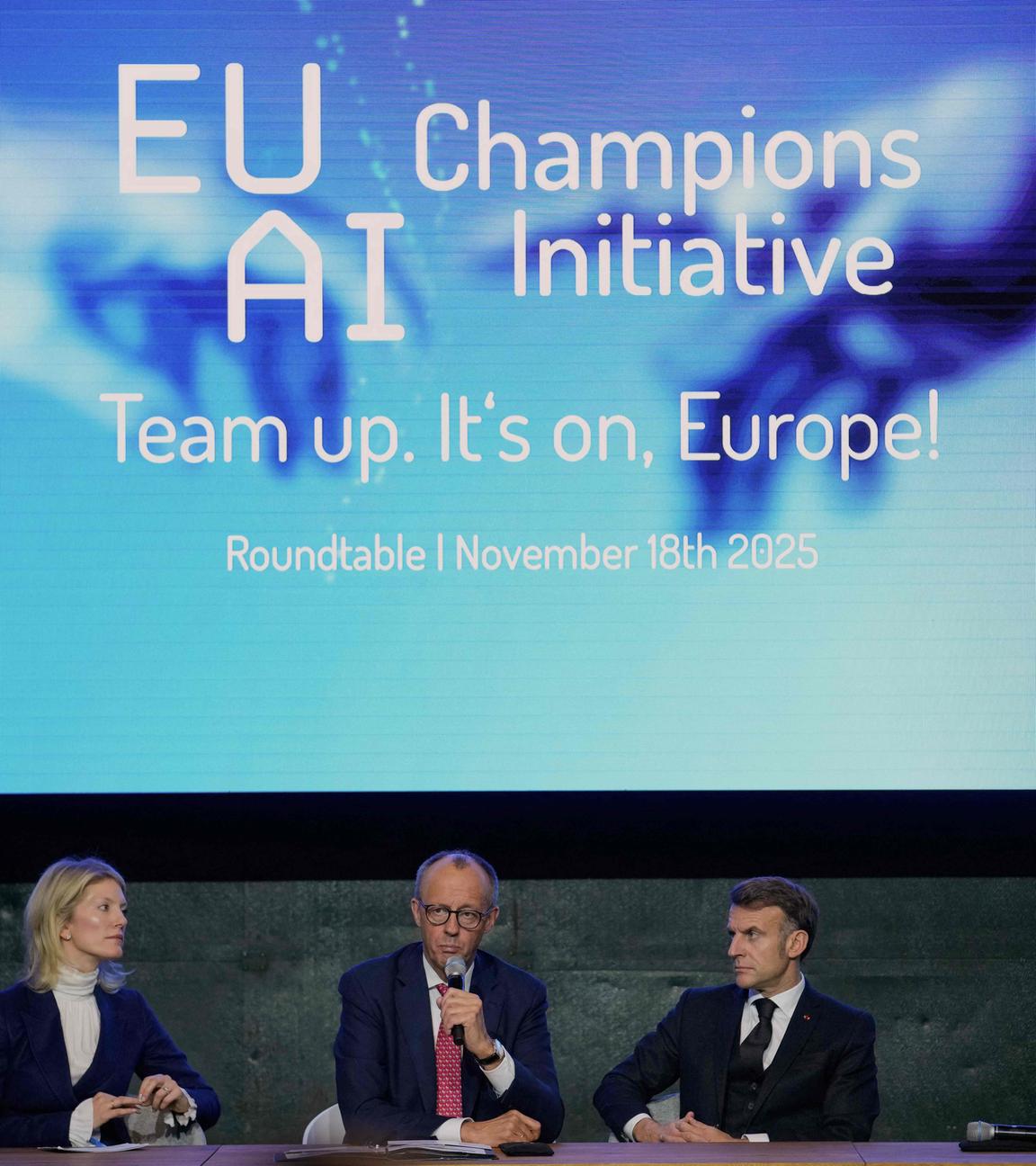 France's President Emmanuel Macron (R), German chancellor Friedrich Merz and Managing director and Head of Europe at General Catalyst Jeannette zu Fürstenberg attend a meeting with investors at the EU AI Champions Initiative at a summit on Europe's technological sovereignty, on November 18, 2025 in the EUREF Campus in Berlin. The German Chancellor and the French President will join forces to push for greater European digital "sovereignty" and less dependence on US tech titans as the AI race gathers pace.