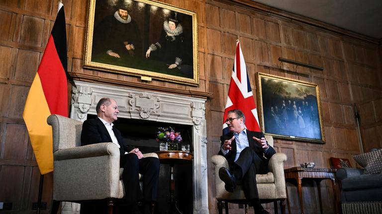 Britain's Prime Minister Keir Starmer, right, speaks with Germany's Chancellor Olaf Scholz during their bilateral meeting at the Chequers, in Aylesbury, England, Sunday, Feb. 2, 2025.