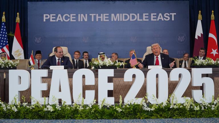 President Donald Trump speaks during a summit to support ending the more than two-year Israel-Hamas war in Gaza after a breakthrough ceasefire deal, Monday, Oct. 13, 2025, in Sharm El Sheikh, Egypt, as Egypt's President Abdel-Fattah el-Sissi listens at left. (AP Photo/Evan Vucci)