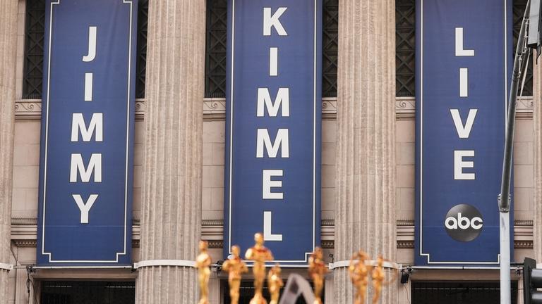Banners are displayed outside El Capitan Entertainment Centre, where the late-night show "Jimmy Kimmel Live!" is staged, in Los Angeles, on Thursday, Sept. 18, 2025.