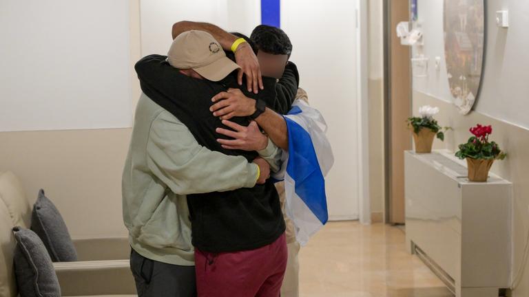  The first three Hamas hostages, who have been in captivity for 15 months, have been handed over to the Red Cross in a historic moment on the first day of the cease-fire between Israel and the terror group.