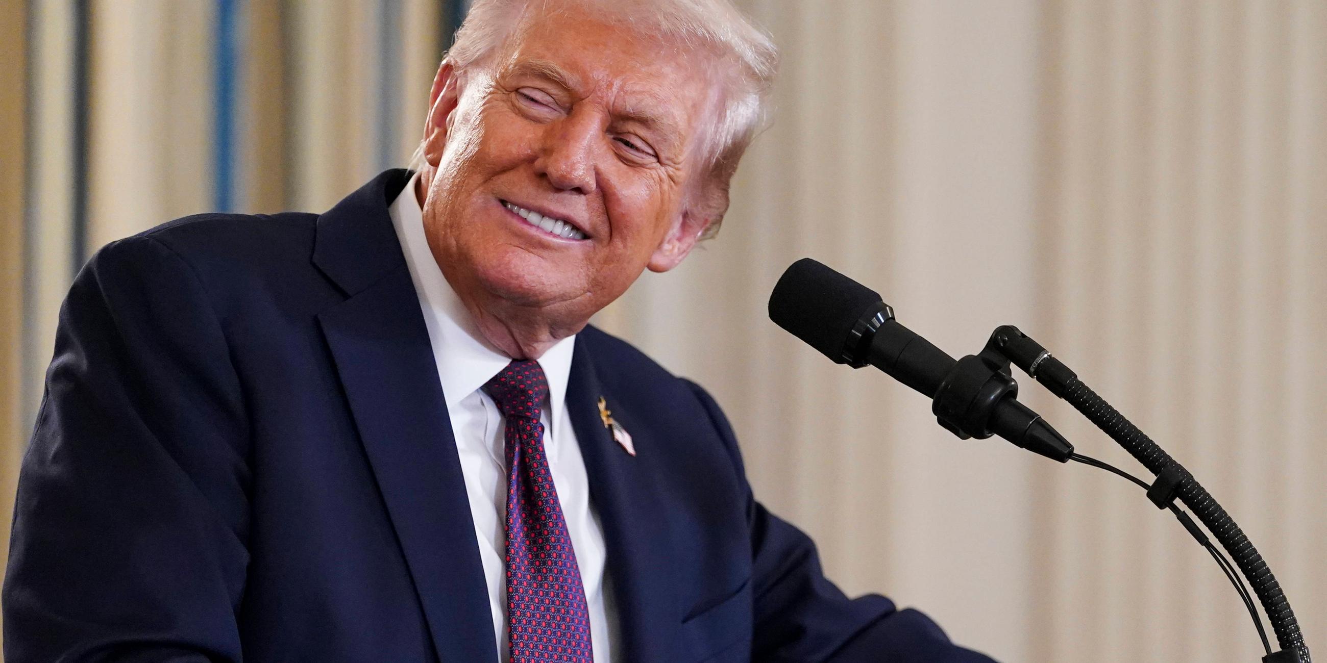 US Präsident Donald Trump lächelt