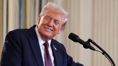 US Präsident Donald Trump lächelt