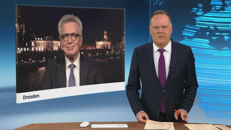 Christian Sievers und homas de Maizière (CDU) sprechen im Schaltgespräch miteinander