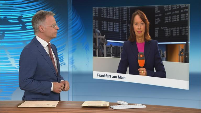 Schaltgespräch an der Börse zwischen Heinz Wolf und Stephanie Barrett 