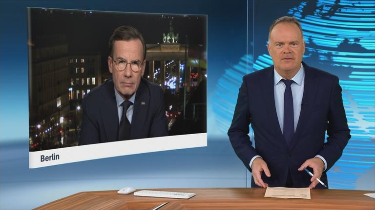 Schwedens Ministerpräsident Ulf Kristersson mit heute journal-Moderator Christian Sievers