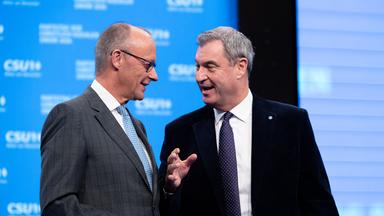 Tag 2, Parteitag 2026 der Partei CSU (Christlich-Soziale-Union) in der Messe München. Friedrich Merz (Bundeskanzler BRD Bundesrepublik Deutschland, CDU) und Ministerpräsident Dr. Markus Söder gemeinsam auf der Bühne 