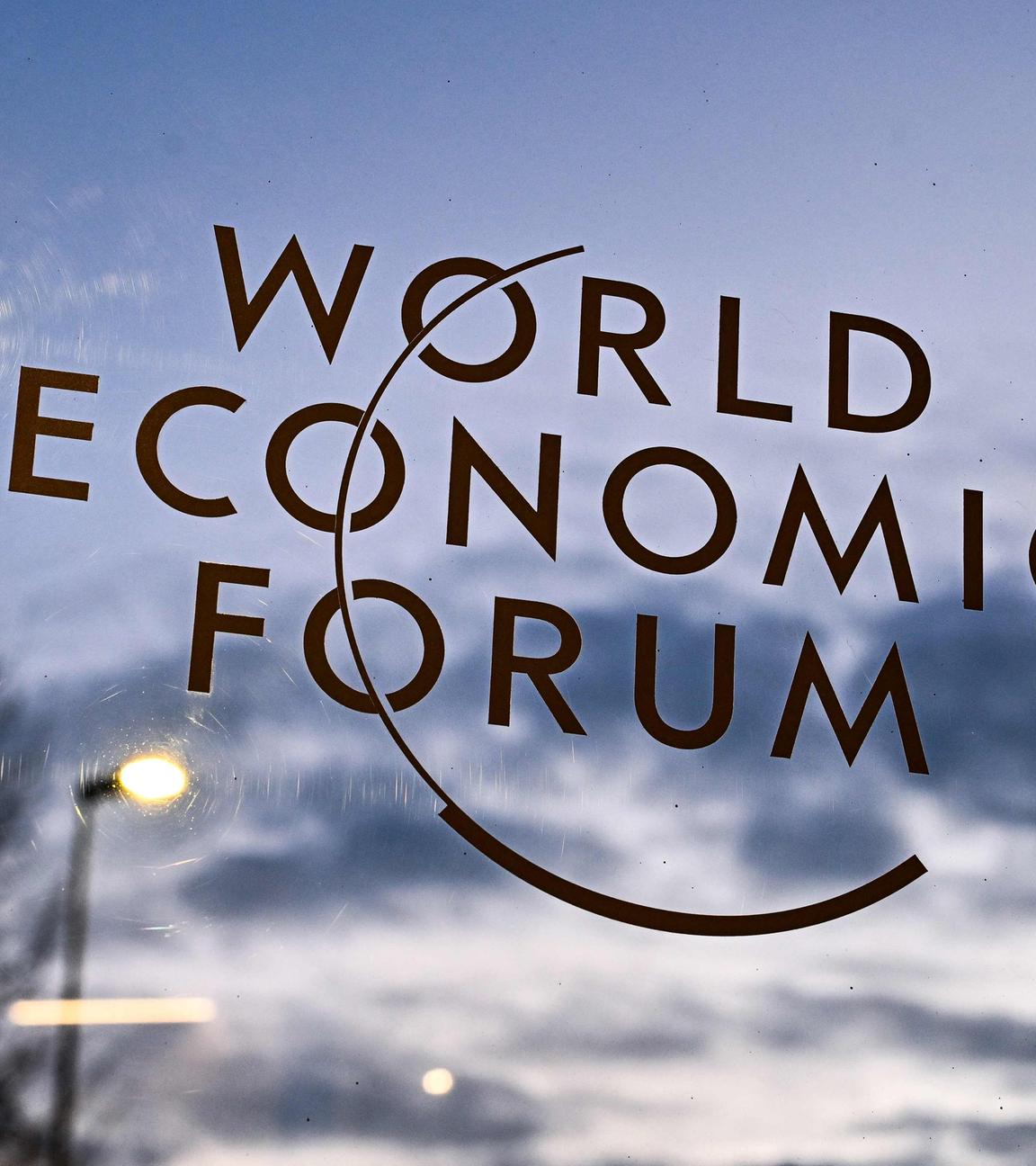This photograph shows the logo of the World Economic Forum (WEF) in Davos on January 22, 2026. The World Economic Forum takes place in Davos from January 19 to January 23, 2026.