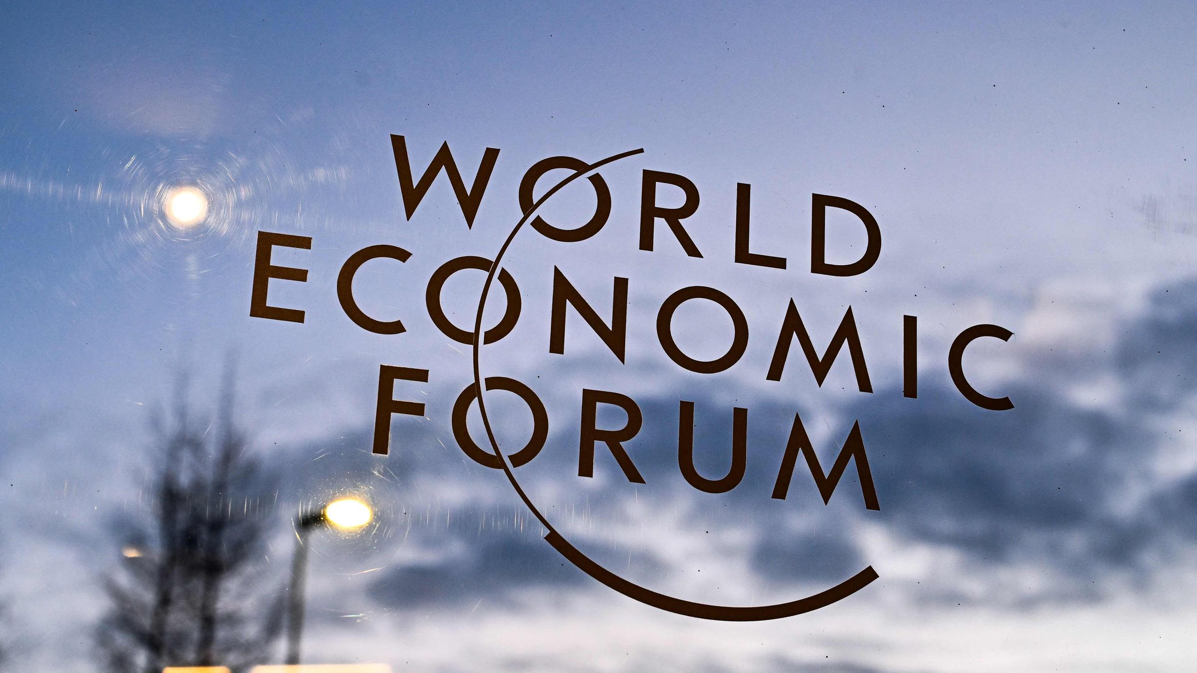 This photograph shows the logo of the World Economic Forum (WEF) in Davos on January 22, 2026. The World Economic Forum takes place in Davos from January 19 to January 23, 2026.