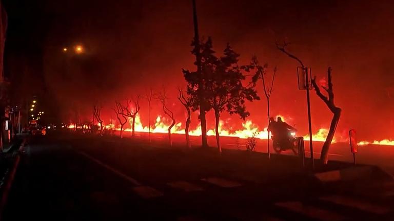 This video grab taken from UGC images posted on social media on March 7 and 8, 2026 shows fire erupting at an oil depot in Iran's capital Tehran. The United States and Israel launched strikes against Iran on February 28, sparking swift retaliation by the Islamic republic which responded with missile attacks across the region. The war has dragged in global powers, upended the world's energy and transport sectors, and brought chaos to even usually peaceful areas of the volatile region.