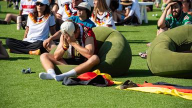 A German fan reacts to Paraguay scoring a goal at a watch party for the World Cup match between Germany and Paraguay in Boston, Massachusetts, on June 29, 2026