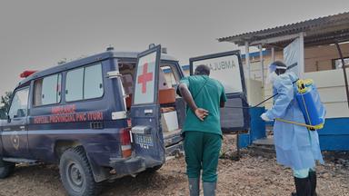 Medical staff disinfect an ambulance used to carry people infected with Ebola at the Rwampara Hospital in Rwanpara, Ituri, Democratic Republic of the Congo, 09 June 2026. The outbreak is caused by the Bundibugyo strain of the Ebola virus, for which there is no treatment, although three vaccines are in development.