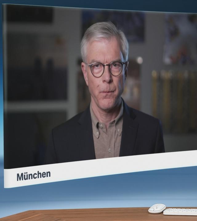 Schaltgespräch zwischen der Moderatorin Dunja Hayali und dem Wirtschaftsexperte Martin Werding. 