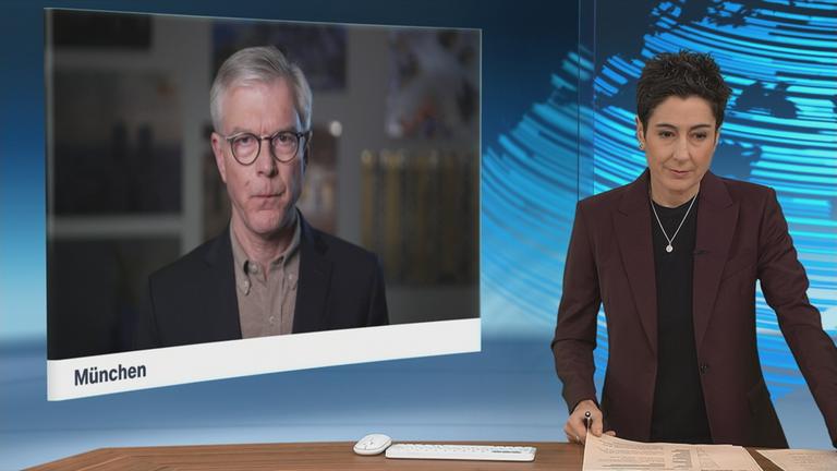 Schaltgespräch zwischen der Moderatorin Dunja Hayali und dem Wirtschaftsexperte Martin Werding. 