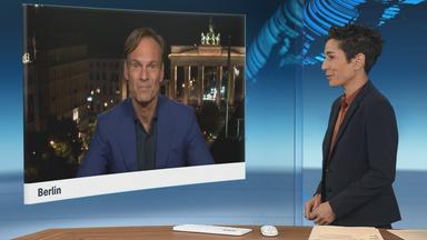 Schaltgespräch zwischen der Moderatorin Dunja Hayali und dem Hauptstadtkorrespondent Wulf Schmiese
