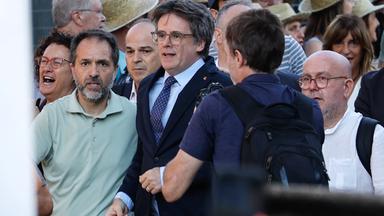 Former Catalan president Puigdemont returns to Spain despite arrest warrant