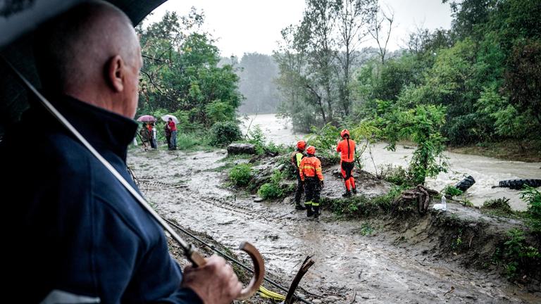 Firefighters search for man swept away by the floods in Turin 