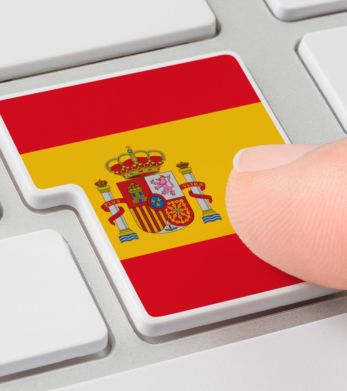 Eine Tastatur mit einer beschrifteten Taste - Flagge von Spanien