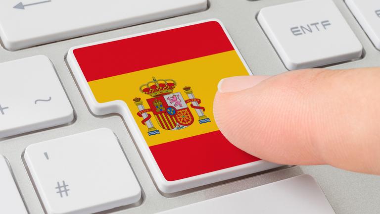 Eine Tastatur mit einer beschrifteten Taste - Flagge von Spanien