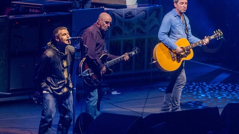 Oasis Reunite For The First Time In 16 Years For The First Night Of Their Tour In Cardiff