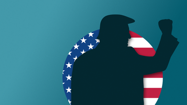 US-Präsident Donald Trump mit erhobener Faust als Schatten vor US-Flagge in Weltkugel-Form