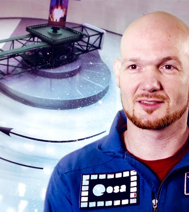 Alexander Gerst vor einer Zentrifuge