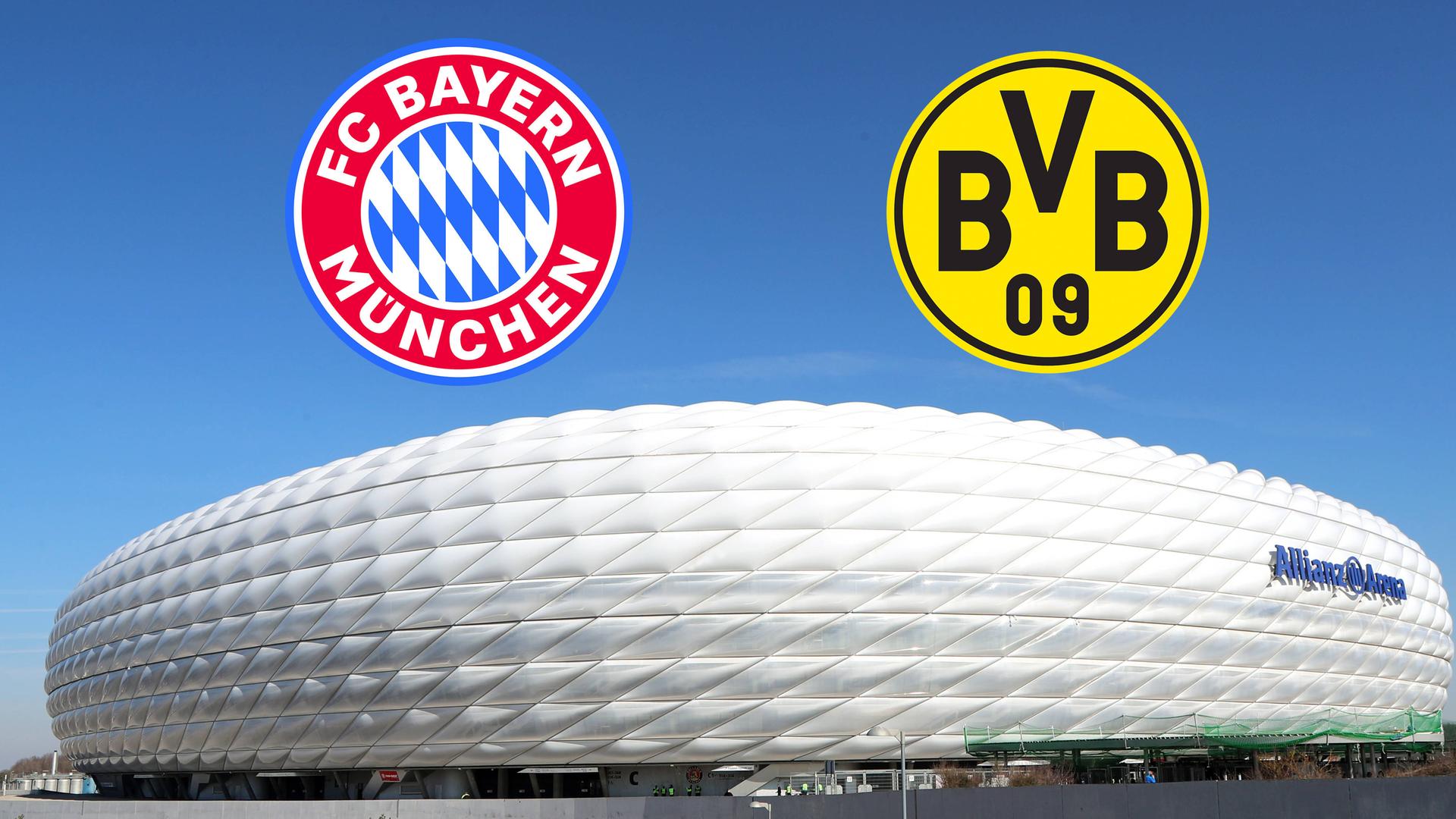 Die beiden Logos vom FC Bayern München und Borussia Dortmund über der Allianzarena 