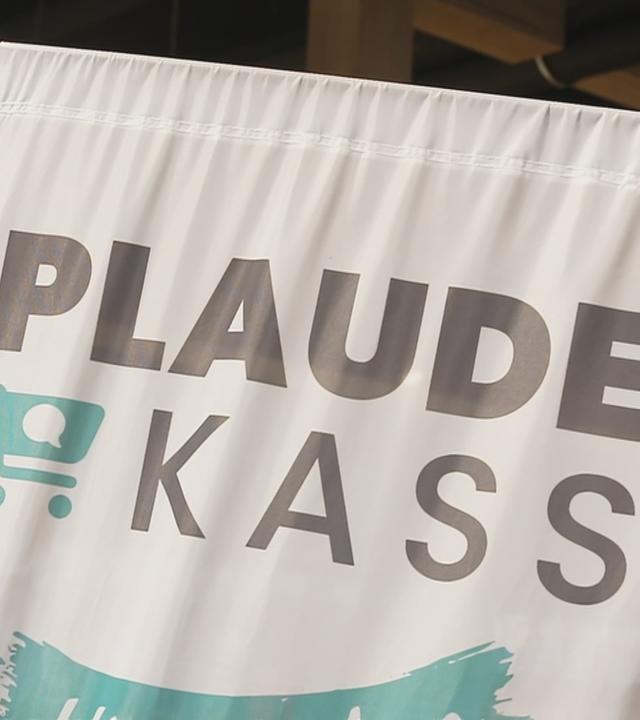 Schild einer "Plauder-Kasse"