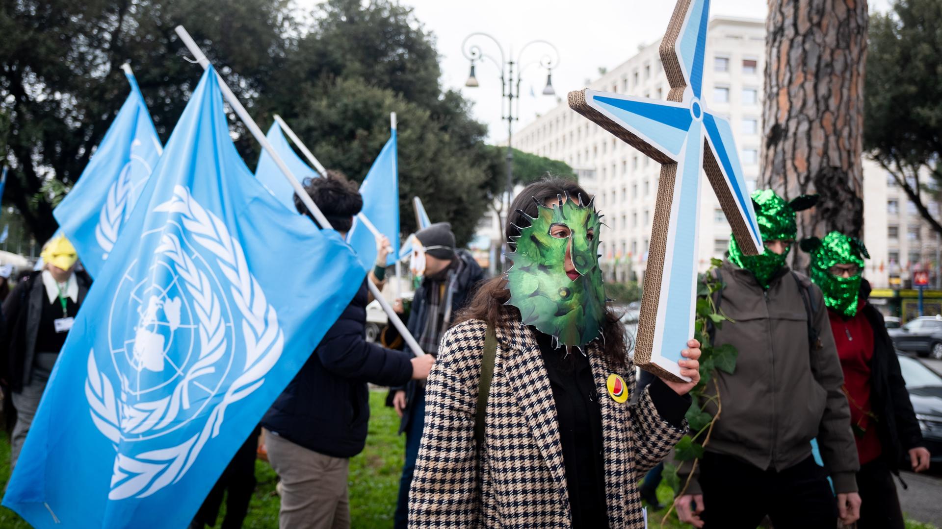 Fridays for Future and Climate Pride activists gather in front of FAO headquarters to ask the assembled international representatives to defend biodiversity and defend the climate.