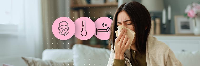 Neben einer Frau, die auf einem Sofa mit einer Decke um sich herum gelegt sitzt und sich die Nase putzt, sind drei Symbole zu sehen: eine Person mit Taschentuch, ein Thermometer und ein Krankenhausbett.