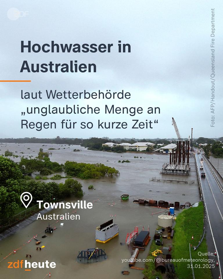 Überschwemmte Bäume und Hafenelemente neben einer Straße. Überschrift: Hochwasser in Australien - laut Wetterbehörde "unglaubliche Mengen an Regen für so kurze Zeit"