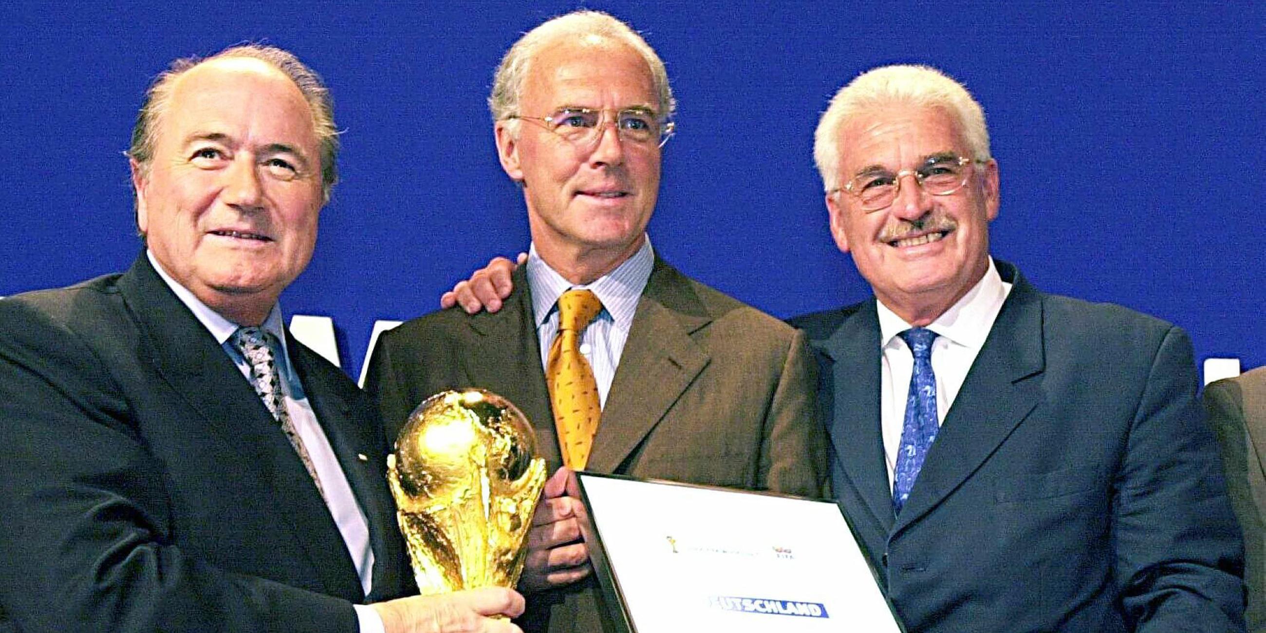 Joseph Blatter, Franz Beckenbauer und Fedor Radmann