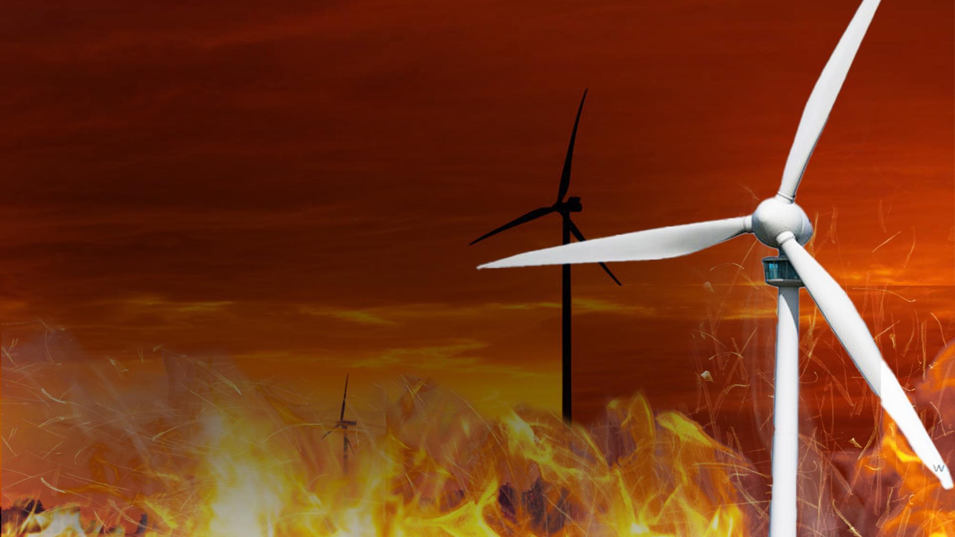Rechts im Bild ein Windrad mit brennenden Rotorenblättern. Im Hintergrund weitere Windräder in Flammen und orangenem Licht.