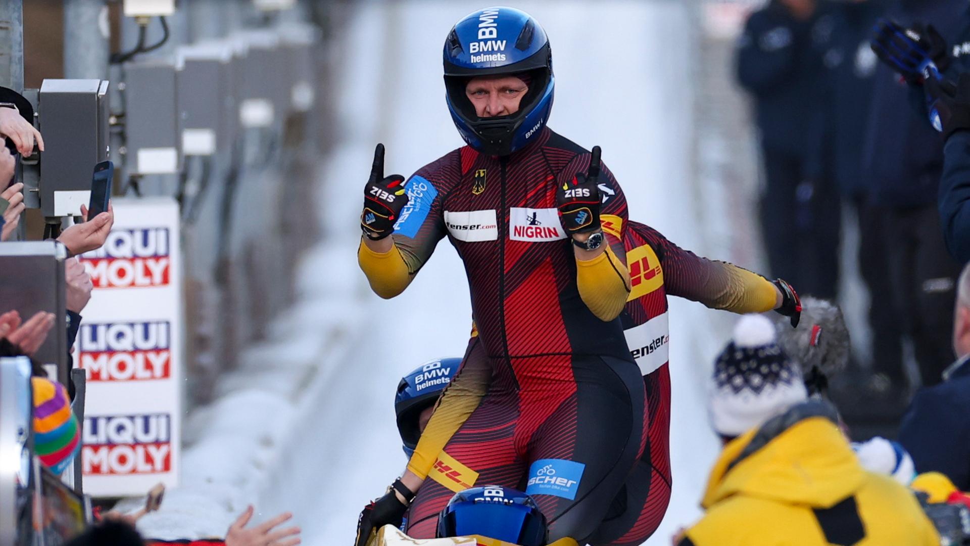 Francesco Friedrich, Thorsten Margis, Alexander Schueller und Felix Straub nach ihrem letzten Lauf im Vierer Bob der Männer.