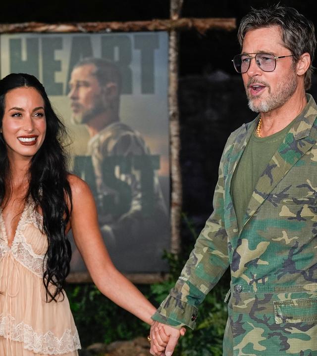 Ein ziemlich ungleiches Paar gaben Brad Pitt und Ines de Ramon bei der Weltpremiere seines neuen Filmes in Tennessee. Er posierte im Tarnfleck, sie im romantischen Spitzenkleid. (17.09.2026)
