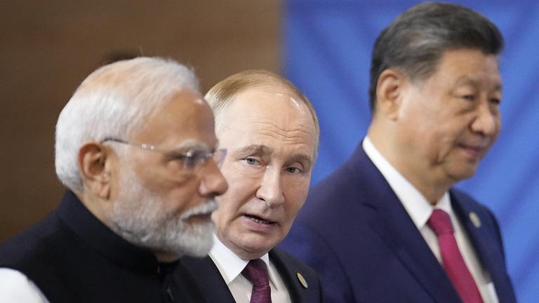 Narendra Modi, Wladimir Putin und  Xi Jinping