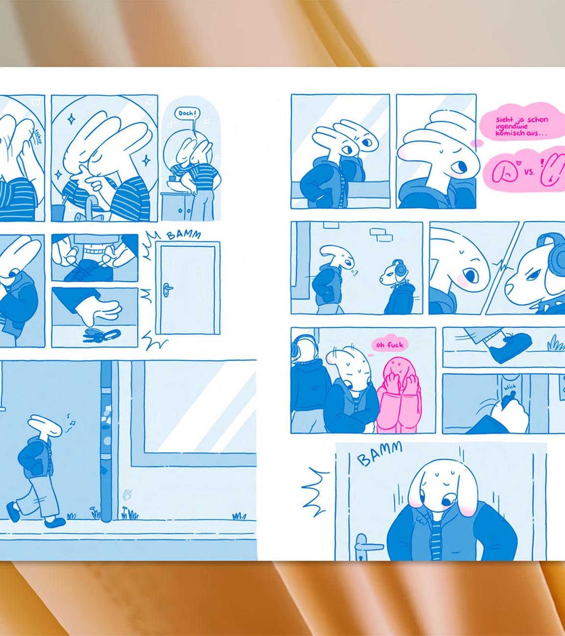 Man sieht die aufgeschlagenen Seiten eines Comicbandes, in den Farben blau und rosa gehalten.