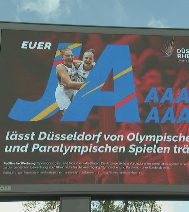 Werbetafel für ein Ja beim Bürgerentscheid zu Olympia