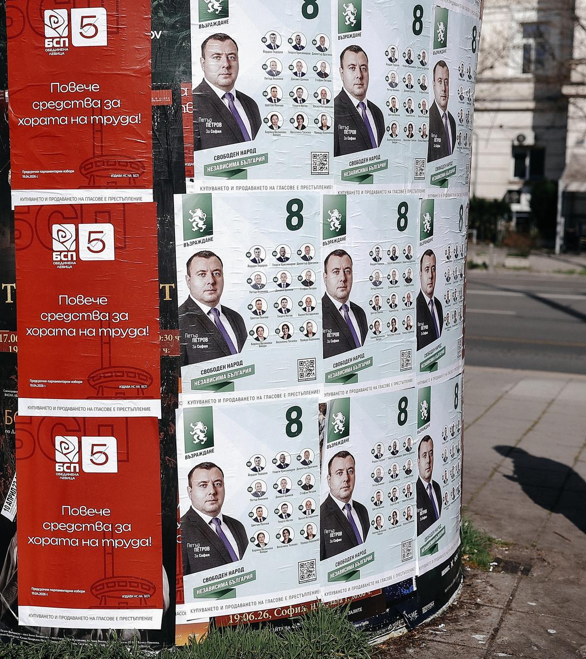 A man observes campaign posters of both Independent Bulgaria party and Bulgarian Socialist Party (BSP) in Sofia, Bulgaria, 17 April 2026.
