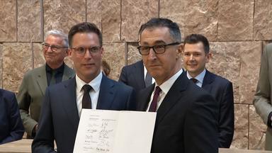 Cem Özdemir neben Manuel Hagel