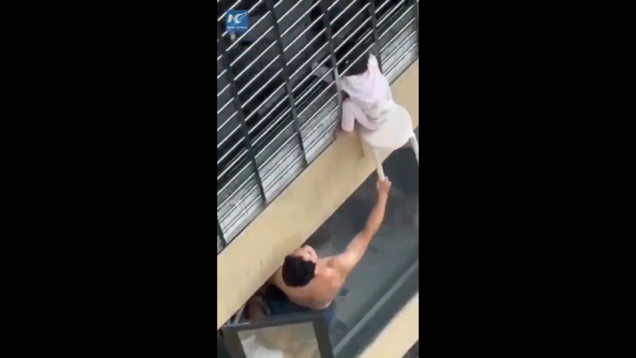 Child spectacularly rescued from fall from twelfth floor