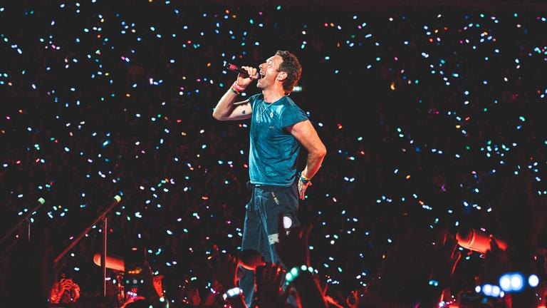 Chris Martin, Sänger der Band Coldplay während eines Konzerts im Wembley Stadium in London. (Archiv)