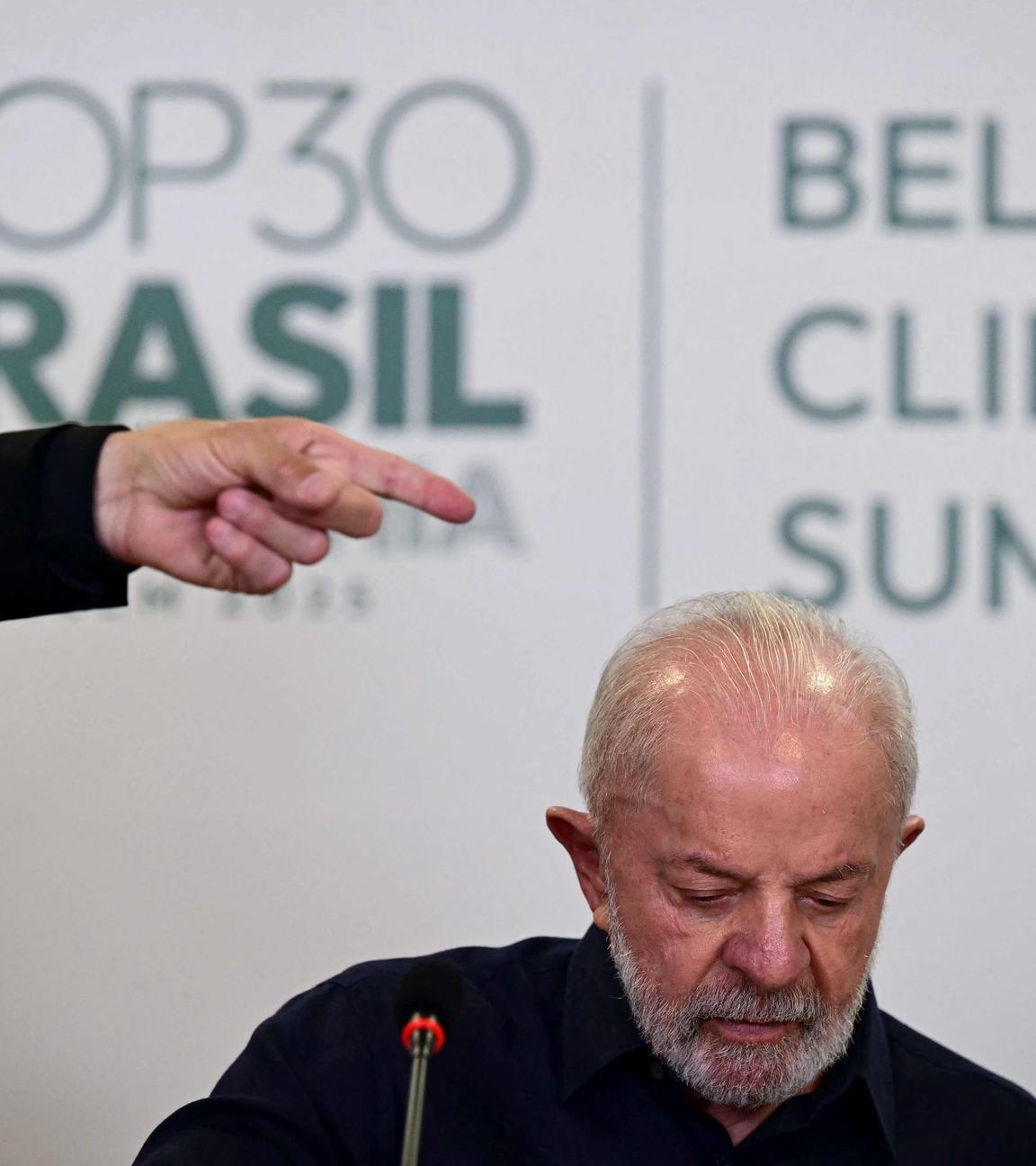 Brazil's President Luiz Inacio Lula da Silva arrives for a briefing with foreign media ahead of the COP30 UN Climate Change Conference